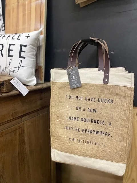 Squirrel Wrangler Jute Tote Bag